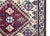 A wonderful early 20th century Persian Afshar rug with a bold tribal pattern with stylized flowers in a diamond medallion...