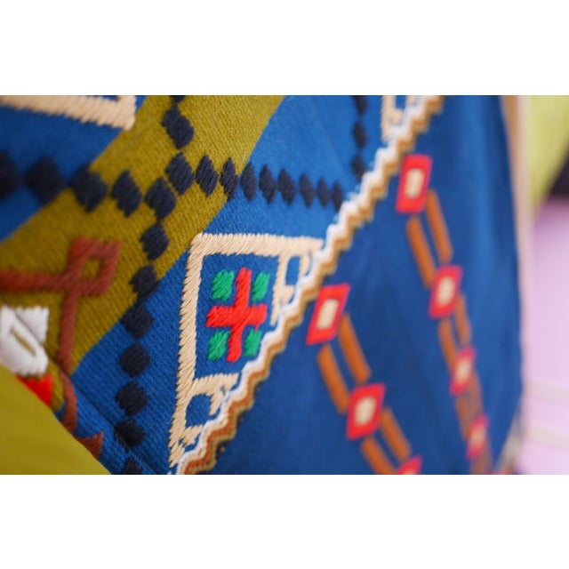 A striking large vintage Swedish textile wall decoration featuring a traditional Jämtland pattern, executed in richly...