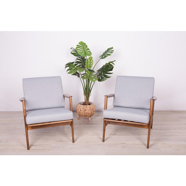 This pair of armchairs was produced by the Polish company Swarzędzka Furniture Factory in 60s. The armchairs have been...