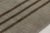 Hand-knotted in wool, this 9x12 Art Deco rug features a refined geometric design in soft taupe and espresso brown....