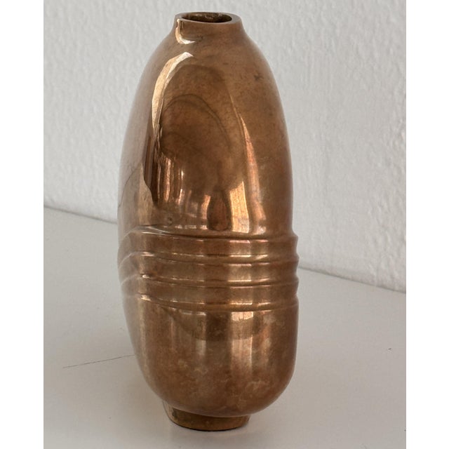 Sculptural 1970s Esa Fedrigolli vase in solid sand cast bronze. Beautiful timeless design. The patina on the metal and the...