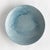 This decorative ceramic plate with a dynamic reactive glaze features a highly textured organic dot pattern that is...