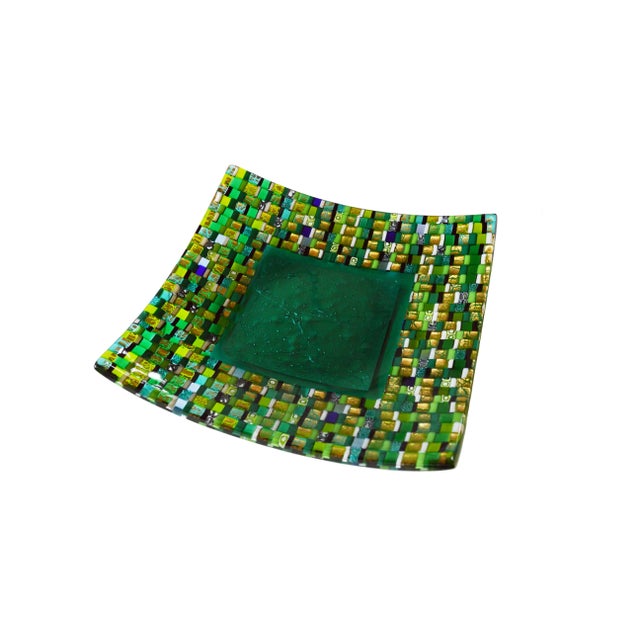 - Decorative plate in Murano glass - Central decoration in transparent green glass - Silver leaf and multicolored side...