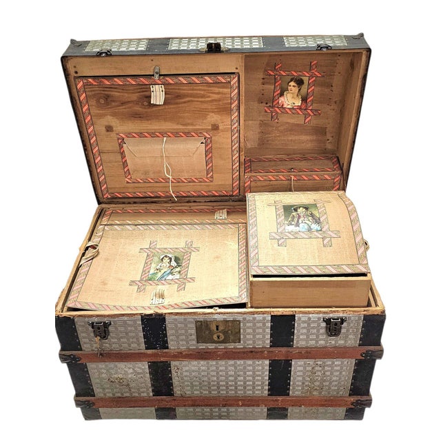 Antique Victorian Saratoga Steamer Trunk With Original Trays and Working Key This magnificent late nineteenth-century...