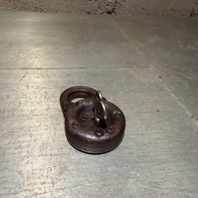 For your consideration, an antique "pancake" style lever padlock, likely an Edwards 6-Lever padlock or a similar model...