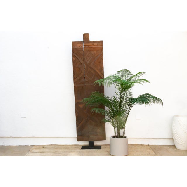 At just under 8 feet tall, this is among the most monumental doors in the collection — hand-carved from a single length of...