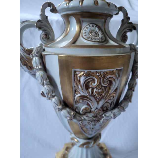 An exceptionally elegant and grand mid-century italian 5-light candelabrum crafted by the renowned artistic porcelain...