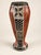 An impressive vintage hand-carved African earthenware pottery vessel featuring striking geometric sgraffito details. Fired...