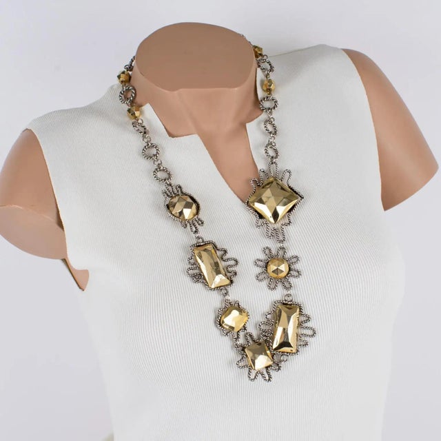 French jewelry maker Alexis Lahellec designed this stunning charm necklace in the 1980s. This piece features a silver...