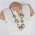 French jewelry maker Alexis Lahellec designed this stunning charm necklace in the 1980s. This piece features a silver...
