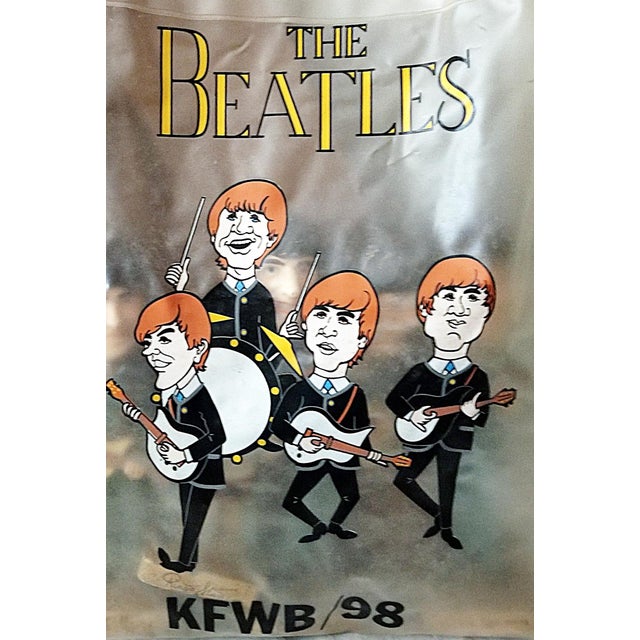 The Fab Four on you dashboard! Period vintage Beatles bobble head figurines and a matching vinyl carry bag, this one from...