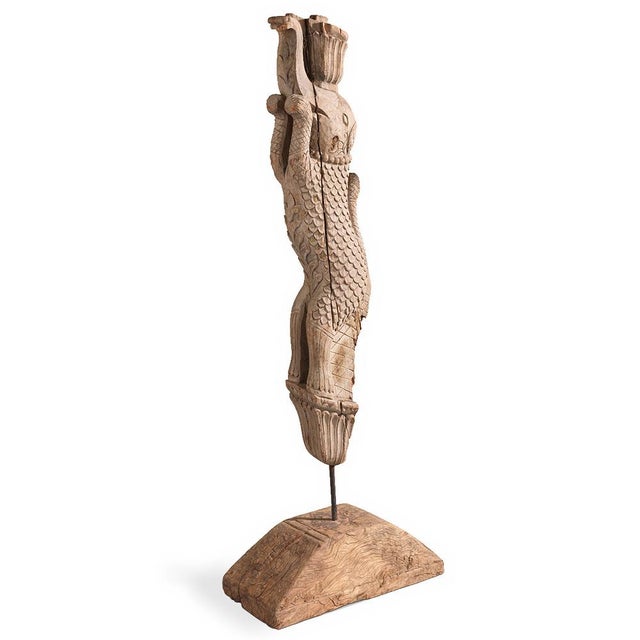 South India, mid to late 20th century A striking hand-carved wooden temple bracket featuring a stylised yali—an ancient...