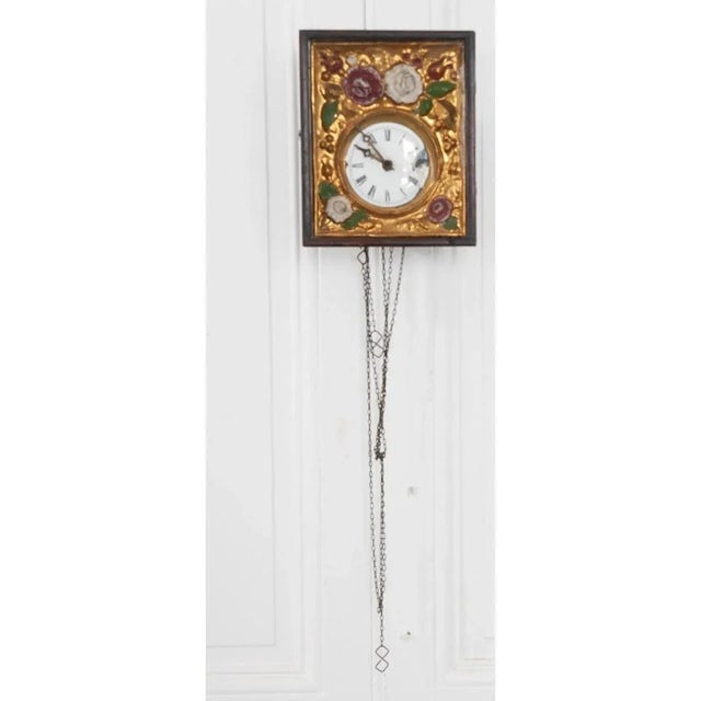 Although this German Black Forest 19th century framed wall clock no longer works, the beauty of its composition gives it...