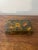A beautifully handcrafted and hand painted lacquered decorative box dating to the mid-20th century. Finished with a rich...