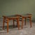 This pair of Ottomans was produced in Denmark during the 1960s by P. Jensen, with one stool retaining the original P....