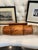 An impressive pair of oversized Texas longhorns mounted with a hand tool;ed leather centerpiece. Striking scale and...