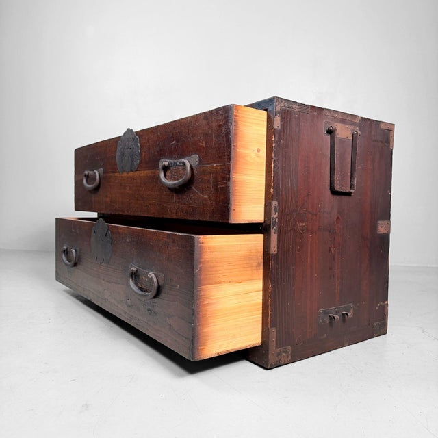 This authentic Japanese tansu storage chest dates from around 1910 and was originally used to keep textiles, kimono and...