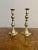 Lovely pair of antique Victorian brass candlesticks having a pair of antique Victorian brass candlesticks with a turned...