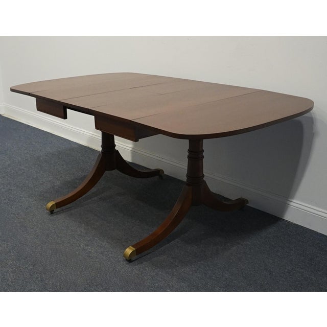CRADDOCK FURNITURE Solid Mahogany Traditional Duncan Phyfe Style 70" Drop Leaf Pedestal Dining Table w. Self Storing Leaf...