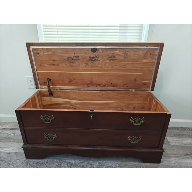 Add a touch of timeless elegance and practical storage to your home with this beautiful vintage "Virginia Maid" cedar...
