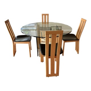 1980s Vintage Italian Glass Table With a Set of 4 Wood and Brown Leather Chairs in the Style of Pietro Costantini For Sale
