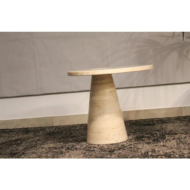 Angelo Mangiarotti style coffee table in Italian Travertino. Part of the Eros series, Italy in the 1970s.