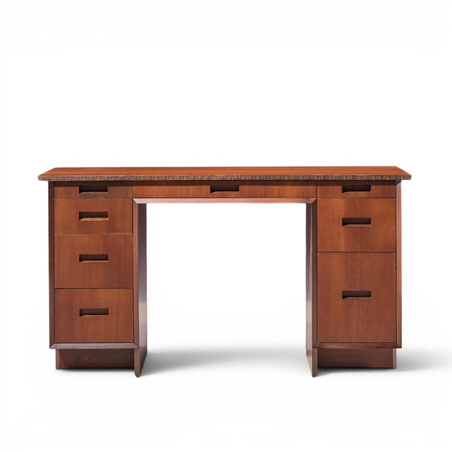Frank Lloyd Wright Taliesin Mid Century Mahogany Desk This desk measures: 51.75 wide x 19.75 deep x 28.25 high, with a...