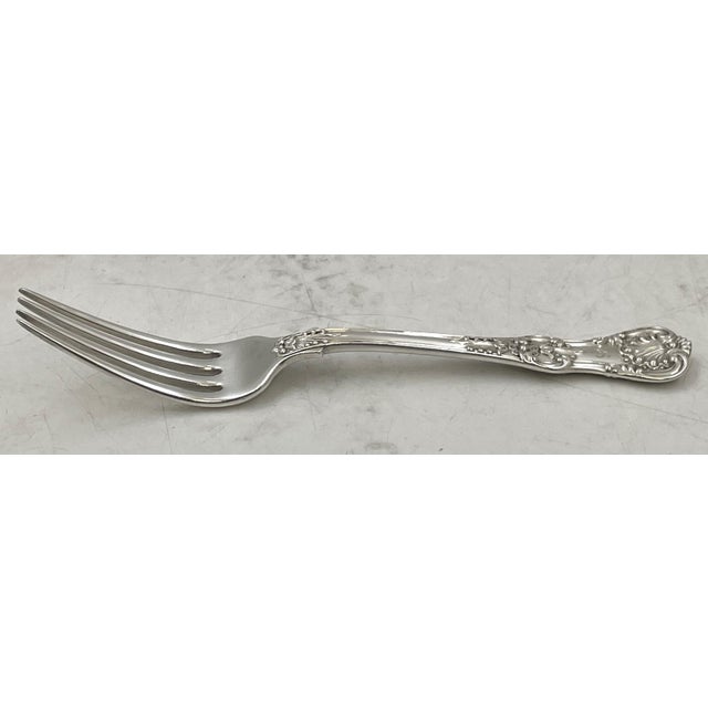 Tiffany & Co. sterling silver flatware set in the celebrated English King pattern, adorned with shells and other motifs,...