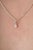 This solitaire pendant features a 0.21 carat pear-shaped diamond set in 14k white gold. The diamond measuring 3.3 x 5 mm,...
