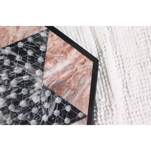 A very unique stone Chinese checkers or display board. Has a mosaic stone design in an pink and black marbled stone. Great...