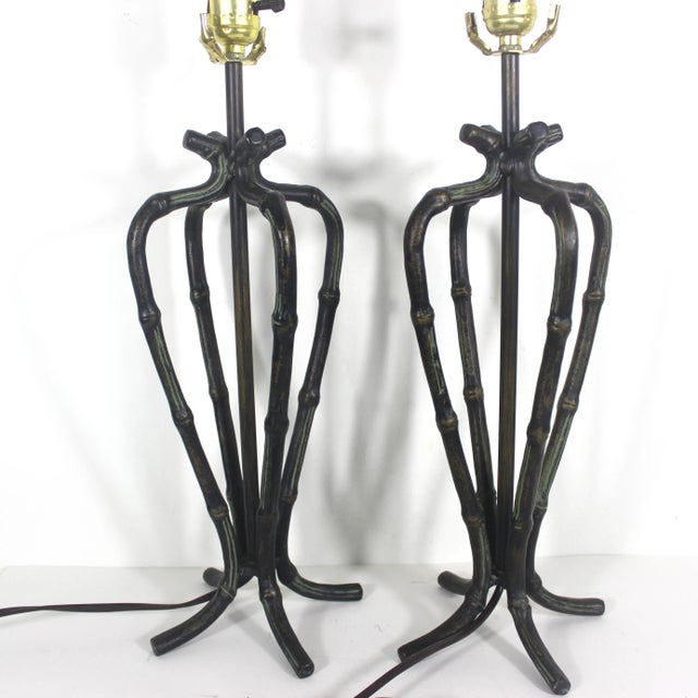 Gorgeous pair of very heavy brass or bronze faux bamboo French lamps. These have applied patina in black, verdigris green...
