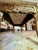 Beautiful piece for any space. A polished slab of white and gray marble with smoothed edges, wood has deep carvings of...