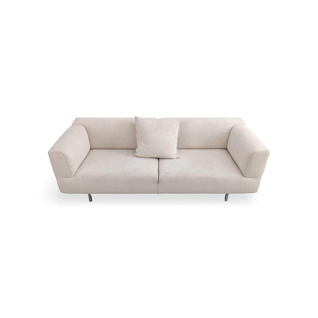 Piero lissoni wanted to create a sofa that appeared so light it seemed to float, yet fulfilled every expectation of...