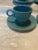 Vintage Fiesta cup and saucer set of 4. This in the color aqua and are in very good condition. 4 cups 3” 4 saucer plates 6”