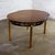 Mid-20th Century MCM to Campaign Style Round to Oval Expanding Dining Table Attributed to Tung Si Collection by Hickory Manufacturing For Sale - Image 6 of 18