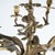 An antique French Louis XIV style hanging candelabra (chandelier) offers gilt cast bronze construction with center column...