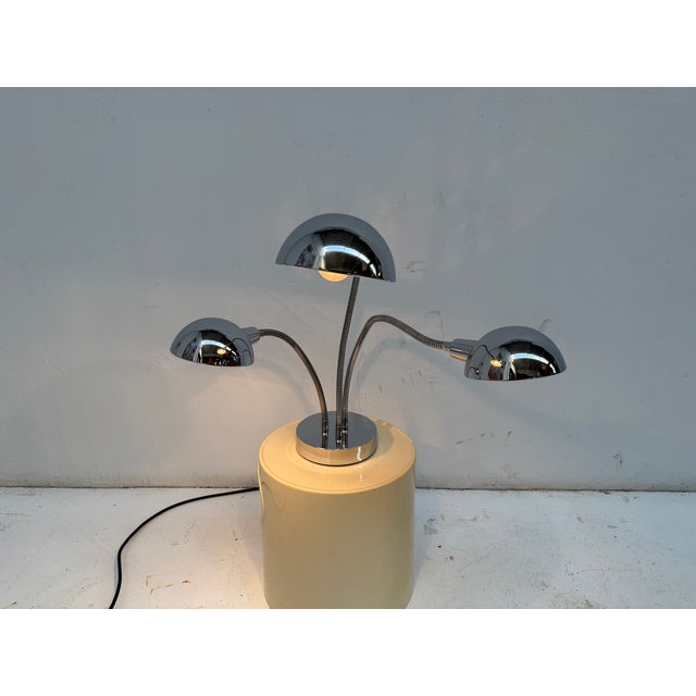 Chrome -plated "Hydra" floor lamp, designed in the 1960s. The "Hydra" lamp has three directed arms, each with a rotating...