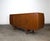 An exceptional example of Danish mid century modern design, this sculptural teak sideboard by Johannes Andersen showcases...