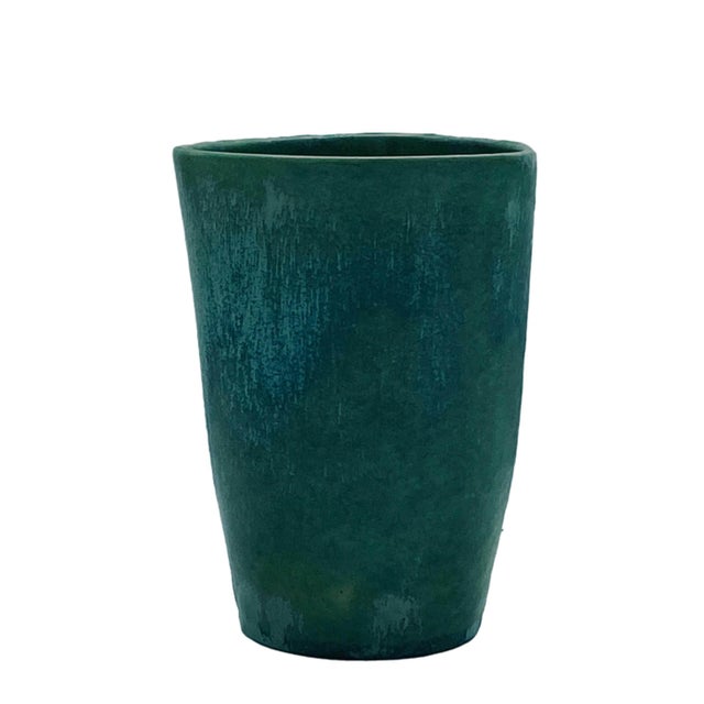 Small earthenware vase modelled by casting and glazed in matt green, by Guido Andlovitz for Societa'ceramica italiana...