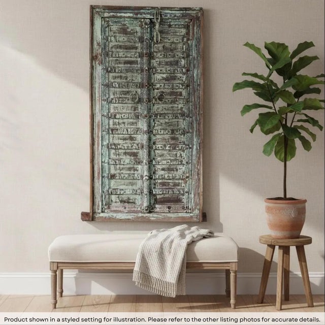 Dimensions: 34” wide X 3” deep X 57” high This vibrant door from Punjab, India is hand carved and beautifully accented...