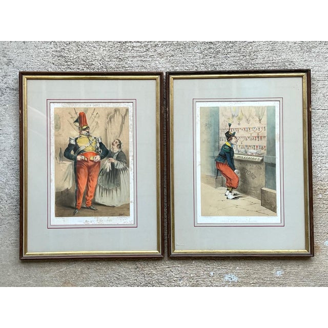 This delightful pair of antique military caricature prints captures the wit and artistry of period illustration through...