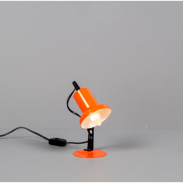 German Orange Desk Lamp from Brilliant Leuchten, 1950s Rare desk lamp, base reminiscent of a bridge or airplane...