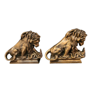 Antique Neoclassical Pair of Bookends Lion Fighting a Serpent Bronzed Metal Spelter