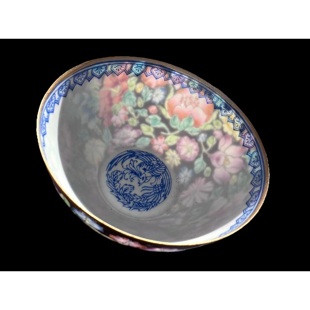Exquisitely hand painted in rich enamels and gilt/gold, a very fine high-quality export small porcelain bowl, as light as...