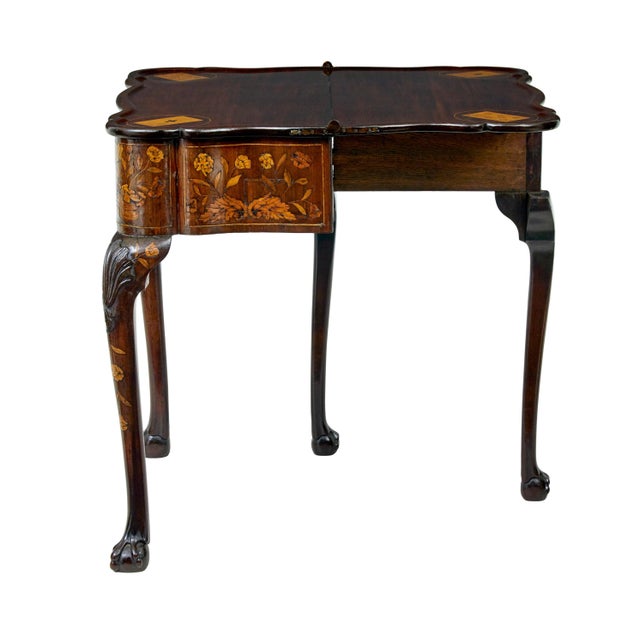 18th century dutch walnut flip top games table circa 1800. shaped top in a reverse serpentine form, beautifully inlaid...