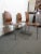 Set of three elegant mid-century modern bent wood chairs.