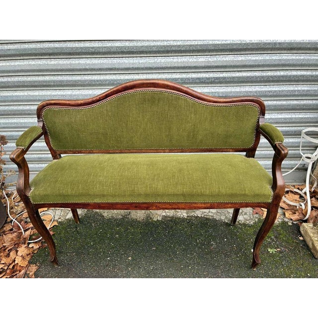 Beautiful green bench in walnut and fabric. Louis Philippe style. Features elegant curves and fine wood, studded fabric...