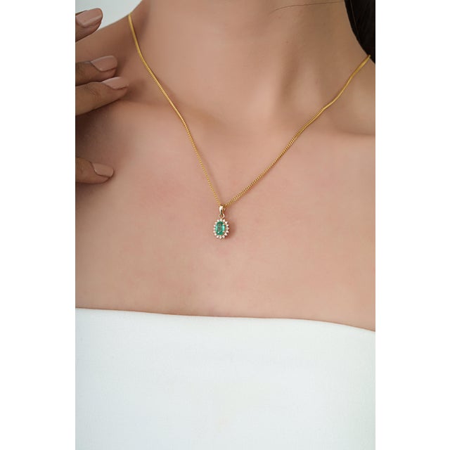 Metal Vintage Inspired Emerald & Diamond Halo Sunburst Pendant in 14k Yellow Gold For Sale - Image 7 of 16