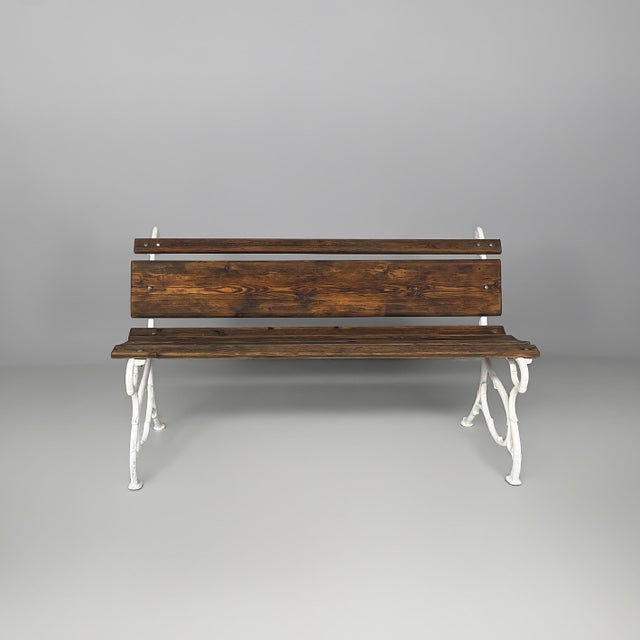 Italian art deco wooden and white cast iron bench, 1930s Outdoor bench with wooden seat and backrest, composed of...