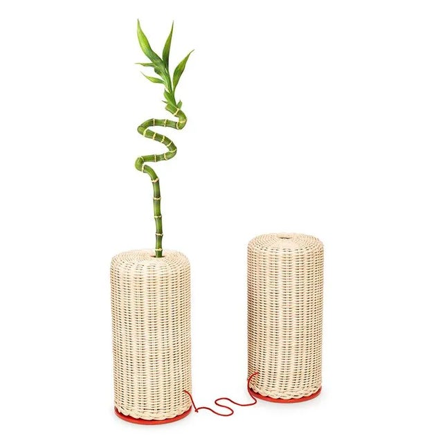 Simbiosi is a pair of hand-woven rattan elements, joined by a red silk thread. The project celebrates the intimate...